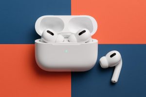 AirPods Pro 3 wireless earbuds displayed in charging case on a sleek, modern surface